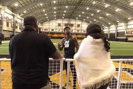 Larry Rountree III talks to his parents