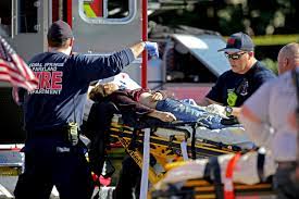 Reports police were searching for suspects riding in a white nissan pathfinder, a report said 17 Killed In Mass Shooting At High School In Parkland Florida