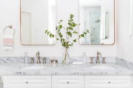 Two small vanities a tucked in between a makeup counter and a large soaking tub (with a tv, so you know they are going to use it). Marble Bathroom Master Bath Reveal Maison De Pax