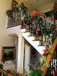 Staircase with wall decor and garland using decorative. 23 Gorgeous Staircase Christmas Decorating Ideas