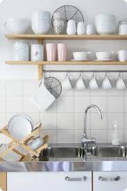 A dish drying cabinet is a piece of kitchen shelving placed above the sink, with an open bottom and shelves made of steel wire or dowels to allow washed dishes set within to drip into the sink and air dry. 25 Stunning Open Kitchen Shelves Designs The Cottage Market