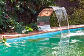 This guide will give you suggestions on how you can construct a backyard waterfall in about a day. Inground Swimming Pool Waterfalls Woodfield Outdoors Pools