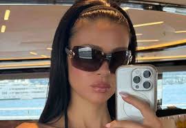 Brooklyn Beckham's wife Nicola seemingly sends a message to his dad David  as she wears his England shorts