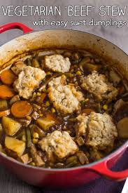 Vegetarian Beef Stew In A Rich Gravy Topped With Easy Suet Dumplings An Old Recipe From An Authentic Britis Vegetarian Beef Stew Vegetarian Stew Easy Stew