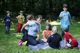 Students immersed in German and the woods at forest school camp