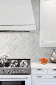 White Modern Marble Chevron Backsplash Tile Backsplash Com In 2020 Backsplash For White Cabinets Contemporary Kitchen Backsplash Kitchen Backsplash Designs