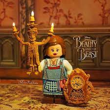 Meet Lumiere And Cogsworth I Sculpted Them Myself You Can Imagine Their Size In Comparison With Belle The Fair Lego Disney Disney Art Beauty And The Beast