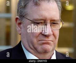 Jan 09, 2006; Brooklyn, New York, USA; PATRICK RYAN, former director of the  Staten Island ferry arrives with an unidentified woman to Brooklyn Federal  Court. Defendants in the Staten Island ferry crash