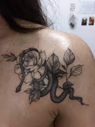 Snake And Rose Tattoo Done By Mae Oh At Blackcanvas Tattoo Kuala Lumpur Chest Tattoos For Women Rose Tattoos Snake Tattoo
