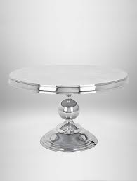 Finished with a blackened patina, the undulating surfaces and porous quality of the cast metal top imbue the table with organic vitality, while slender, tapered legs and the top's reverse beveled edge lighten the look and keep the lines clean. Aluminum Coffee Tables West Coast Event Productions Inc
