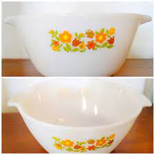 There's a 1 1/2 quart casserole with clear glass cover. Vintage Gingham Floral Anchor Hocking Fire King Nesting Bowl Milk Glass W Floral Pattern Of Plaid Tulips And Daisies Fire King Nesting Bowls Vintage Gingham