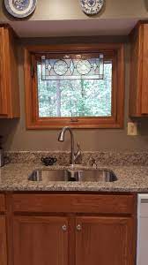 Best Granite To Tie Together Oak Cabinets And White Appliances Blanco Tulum Granite Gettysburg Gr Honey Oak Cabinets Kitchen Remodel Countertops Oak Cabinets