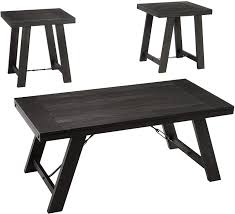 With three elegant furnishings to enhance your home, this set of tables is fashionable and functional. Amazon Com Signature Design By Ashley Noorbrook Casual 3 Piece Table Set Coffee Table And 2 End Tables Set Of 3 Black Table Chair Sets