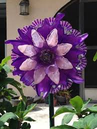 We decided to go that route instead. Garden Flower Made From Glass Bowls And Dishes Glass Plate Flowers Glass Garden Flowers Garden Crafts