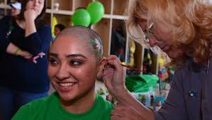 Volunteers get heads shaved for children, raising thousands