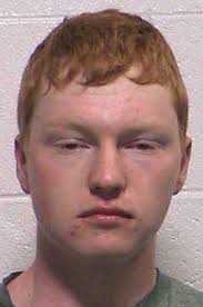 Robbery suspect turns himself in