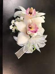 Mom S Corsage Double Cymbidium Orchid Wrist Corsage In Roswell Ga The Best Little Flower Shop In 2020 Wedding Flowers Cymbidium Orchids Orchids