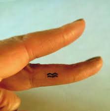 50 Best Aquarius Tattoos Designs And Ideas With Meanings Finger Tattoos Wild Tattoo Fake Tattoos