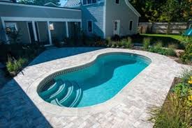 The kids favorite part of swimming is of course jumping in the pool. Guide To Small Inground Pools For Small Backyards Medallion Energy