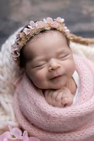 Don't you just love baby smiles? What do you think they are smiling about?