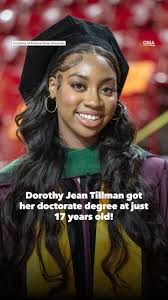 Dorothy Jean Tillman II walks across ASU's commencement stage to receive  her doctorate
