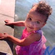 'A happy little girl': Vigil held for family who died in September 2020  house fire