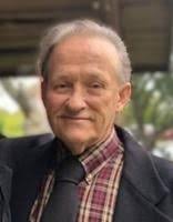 Jackson Downey standing at football camp.png