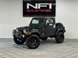 Image result for Brilliant Black 2005 Jeep