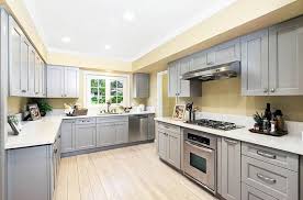 Use white when you need to bring light into a dark space and a deep shade of gray to create definition. Kitchen Colors With Gray Cabinets Designing Idea