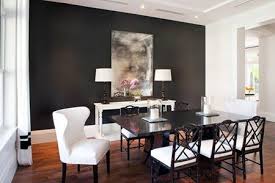 Our dining room walls are the one space in our home that gives us creative license to do something totally unexpected. Dark Gray Accent Wall In Dining Room Benjamin Moore Paint Color Black Beauty 2128 10 Black And White Dining Room Black Dining Room Grey Dining Room