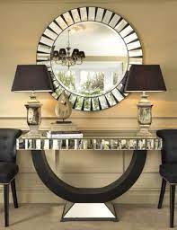 The rectangular console is mirrored on both sides making it suitable for use in the center of a room as well as against a wall, making it a stunning entryway console table or occasional table behind a couch in the living room.features: Canora Grey Wynyard Console Table And Mirror Set Konsolentisch Konsolen Tisch Konsole