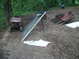 This soil screener features springs and hinges made from old car tires so there is no need for regular steel springs and metal hinges (and the major hassle mounting them). Homemade Screening Plant My Tractor Forum