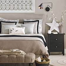 There are various styles that you can try to make a neutral bedroom look less boring and one of them is by adding another accent like this black wall and the beige area rug under the bed. Neutral Bedroom Design Ideas Decorating Ideal Home