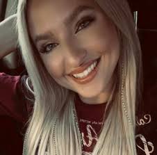 Melanie's Cutting Edge added a...