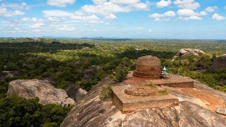 Kudumbigala monastery ruins cave shelters ancient Buddhist granite boulders jungle Sri Lanka