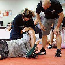 Tabling on a glass table will stun for a long duration, but will break the table. Close Quarter Combat Self Defence Training