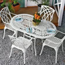 With a wide selection of table and chair materials and styles to choose from, such as our nevada rattan furniture collection, helsinki bistro sets and wooden garden furniture sets, you can complete your outdoor space with ease and start making the most of the brighter weather. White Elise Oval 4 Seater Metal Garden Table Set Lazy Susan