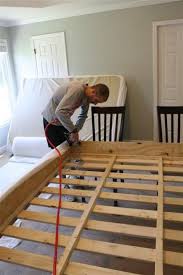 The sturdy solid wood base holds four spacious drawers, perfect for storing. Diy Upholstered Platform Bed Diy Platform Bed Diy Bed Woodworking Plans Diy