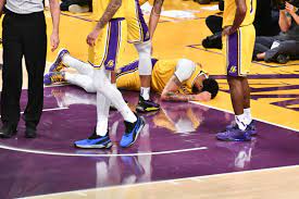 Lakers forwards lebron james, left, and anthony davis stand near the team during a timeout tuesday in brooklyn. Anthony Davis Injury Update Lakers Star To Miss Two Games With Back Injury