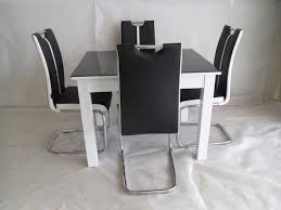 Primo Extending Dining Table With 4 Chairs Colour Black White Extendable Dining Table Dining Table Black White Dining Chairs