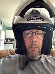 White helmet to match black jacket and pants