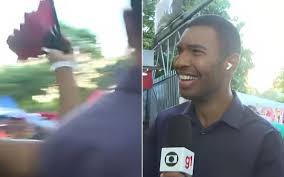 Repórter da Globo vive "saia justa" ao vivo com leque no rosto e palavrão inesperado