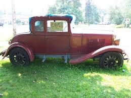 Image result for Martini Brown 1931 Oldsmobile