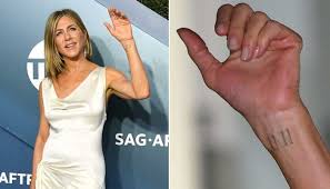 Brad pitt has four tattoos which we know of, including an outline tattoo on his left forearm of ötzi the iceman, aka frozen fritz and similaun man. Jennifer Aniston S 11 11 Wrist Tattoo Gives A Glimpse Of Her Spiritual Side Queentone