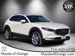 Image result for Hailey Orange 1966 Mazda