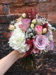 The classic flower — but paler. Bridesmaid Bouquet Wedding Flowers Faith Rose White Ohara Rose Cool Water Rose Bombastic Ros Flower Bouquet Wedding Marsala Flowers Prettiest Bouquet