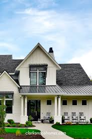 Harga genteng metal 2021 sangat bervariasi tergantung merek dan kualitas. The Heartland Black Windows White Painted Brick Metal Roof And Awnings All Combine Toget White Exterior Houses Modern Farmhouse Exterior White Brick Houses