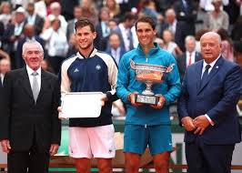 Here is rafa recieving the french open trophy for the 6th time from former champion jim courier. Winner Rafael Nadal Of Spain And Runner Up Dominic Thiem Of Austria Pose With Their Trophies Following The Mens Singles Final French Open Tennis Stars Winner