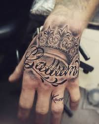 Name Hand Tattoo 30 Brilliant Name Tattoo Ideas For Men Hand Tattoos Names Tattoos For Men Name Tattoo On Hand
