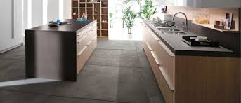 Check out these 20 gorgeous examples check out this dark, gray wood laminate floors that highlight this super rustic and trendy kitchen space. Dark Floor Kitchens Gallery Kitchen Magazine